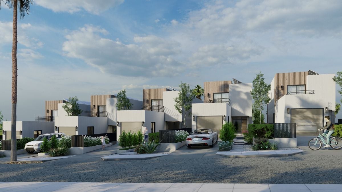 Modern townhouse community with clean white architecture and contemporary urban housing design